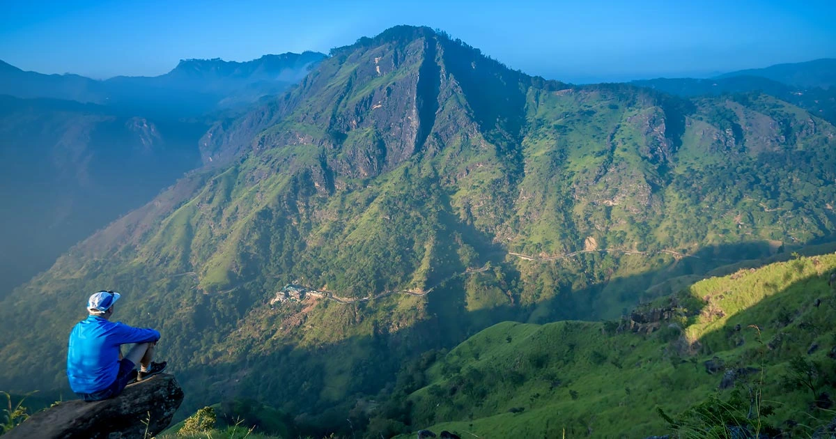 Ella Rock hiking trail Sri Lanka - Scenic mountain trek with Nine Arch Bridge and tea plantation views